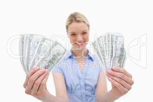 Woman holding money in her hands