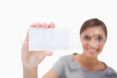 Blank business card being presented by woman