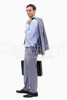 Side view of businessman with suitcase