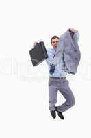 Happy businessman jumping