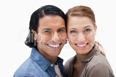 Smiling couple standing close together