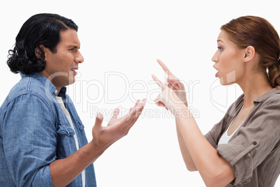 Side view of arguing couple