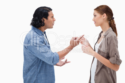 Side view of couple having a serious conversation