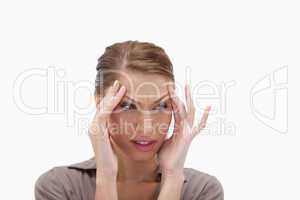 Woman experiencing a headache