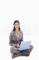 Woman sitting with her notebook