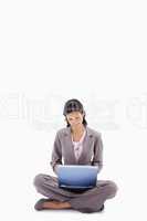 Sitting woman working with laptop