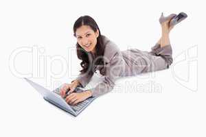 Lying woman with her laptop