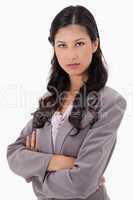 Serious businesswoman with arms folded