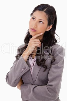 Thoughtful businesswoman touching her chin