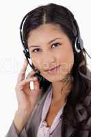 Confident looking businesswoman with headset on