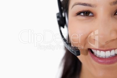 Smiling female call center agent with headset