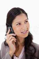 Woman listening to caller on the phone