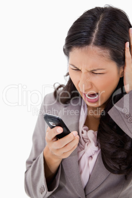 Woman yelling at her cellphone
