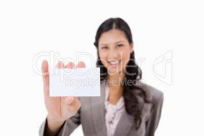 Businesswoman with blank business card
