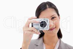 Businesswoman taking a picture