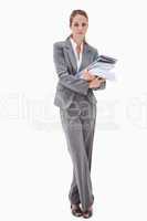Office employee with pile of paperwork