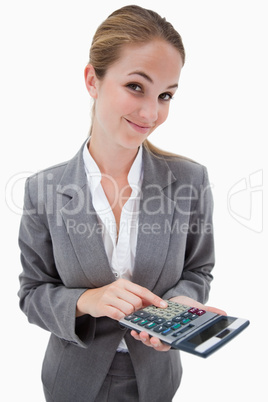 Bank employee with pocket calculator