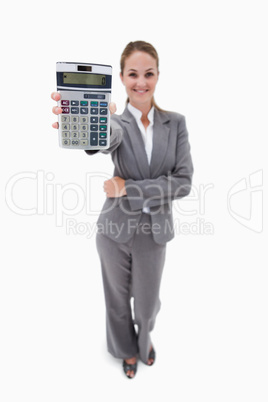 Smiling bank employee showing pocket calculator