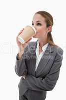 Portrait of a businesswoman drinking a takeaway coffee