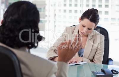 Manager interviewing a male applicant