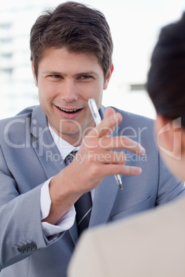 Portrait of a happy manager interviewing a female applicant