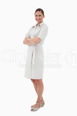 Portrait of a casual businesswoman posing with the arms crossed