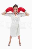 Portrait of a businesswoman with boxing gloves