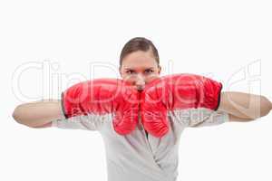 Businesswoman with boxing gloves