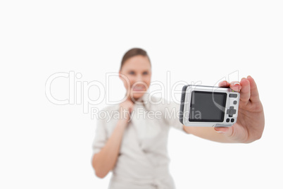 Businesswoman taking a picture of herself
