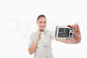 Businesswoman taking a picture of herself