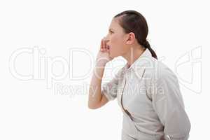 Side view of a businesswoman shouting