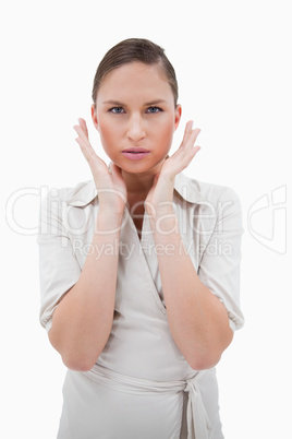 Portrait of a businesswoman with her hands around her face