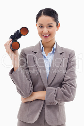 Portrait of a businesswoman holding binoculars