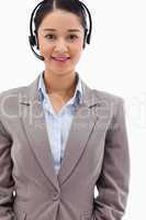 Portrait of a brunette operator posing with a headset