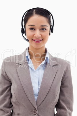 Portrait of a smiling operator posing with a headset