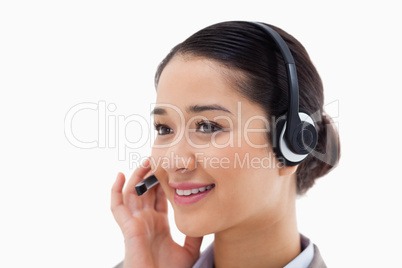 Close up of an operator posing with a headset