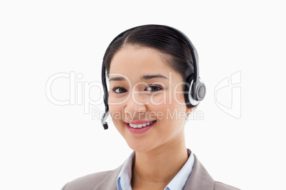 Smiling operator posing with a headset