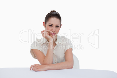 Happy businesswoman sitting