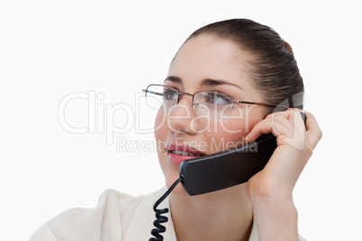 Close up of a secretary making a phone call