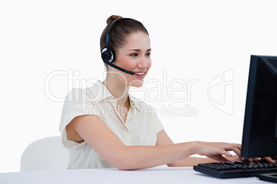 Smiling secretary making an appointment