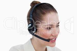 Close up of an operator talking through a headset