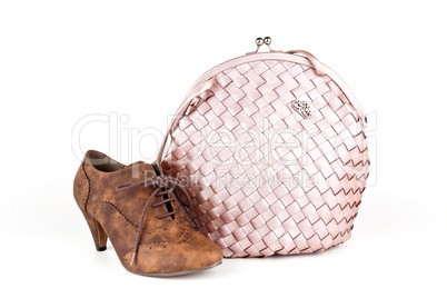 Pink bag with a shoe.