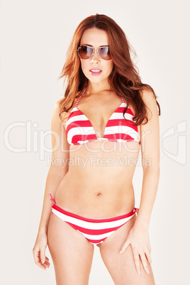 Sexy Redhead In Sunglasses And Bikini