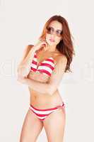 Redhead Model Wearing Bikini And Sunglasses
