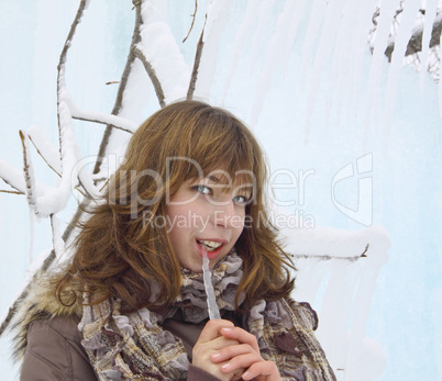 The beautiful girl with an ice icicle