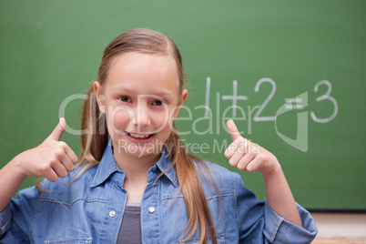 Schoolgirl with the thumbs up