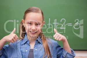 Schoolgirl with the thumbs up