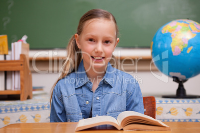 Schoolgirl reading a book