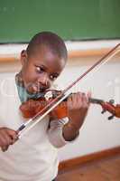 Portrait of a schoolboy playing the violin