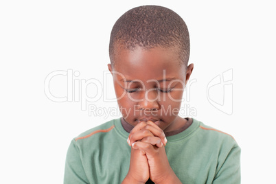 Young boy praying